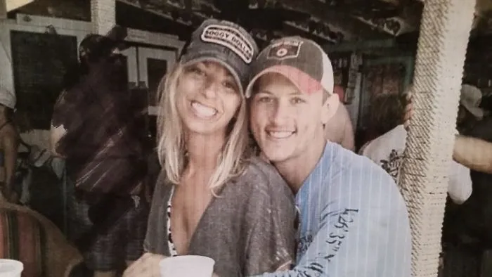 Couple Asks Internet To Photoshop Out Shirtless Guy From Engagement Photo, Regrets It Immediately
