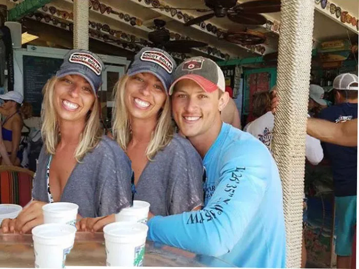 Couple Asks Internet To Photoshop Out Shirtless Guy From Engagement Photo, Regrets It Immediately