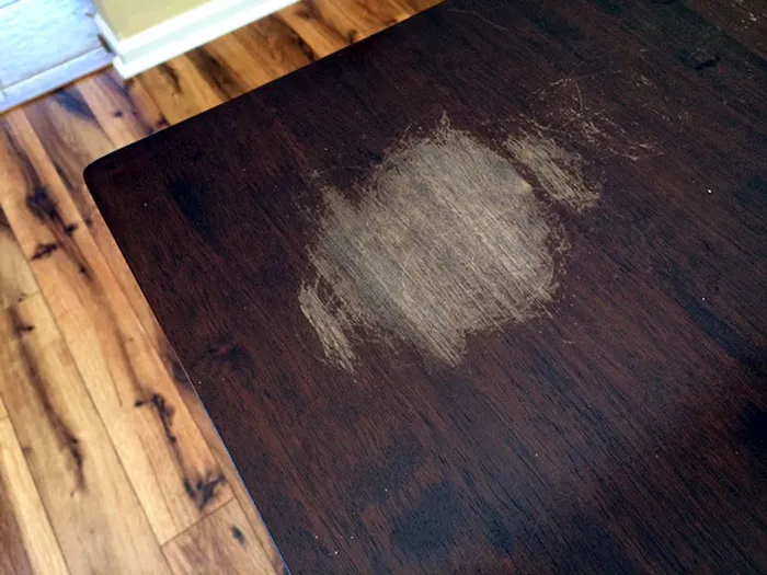 The Finish On This Table Is Worn Off From Opening Wine Bottles In The Same Spot For Five Years