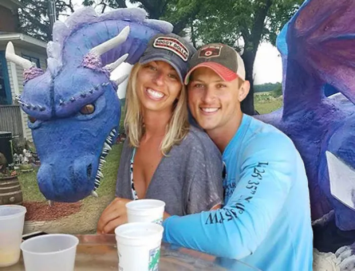 Couple Asks Internet To Photoshop Out Shirtless Guy From Engagement Photo, Regrets It Immediately