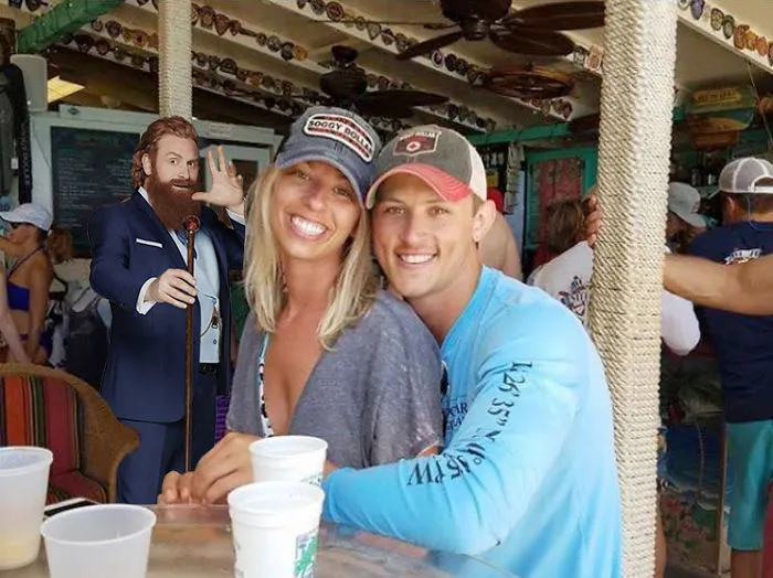 Couple Asks Internet To Photoshop Out Shirtless Guy From Engagement Photo, Regrets It Immediately