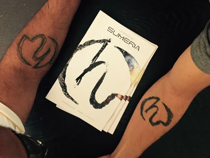 Harvard Professor And Best Friend Fully Committed To 1st Sci-Fi Graphic Novel...and They Have The Tattoos To Prove It!