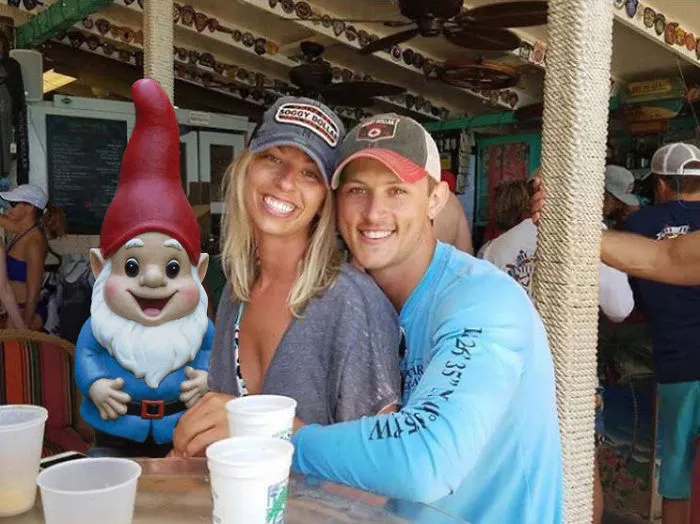 Couple Asks Internet To Photoshop Out Shirtless Guy From Engagement Photo, Regrets It Immediately