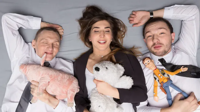 Why Am I Lying In Bed With Two Men?