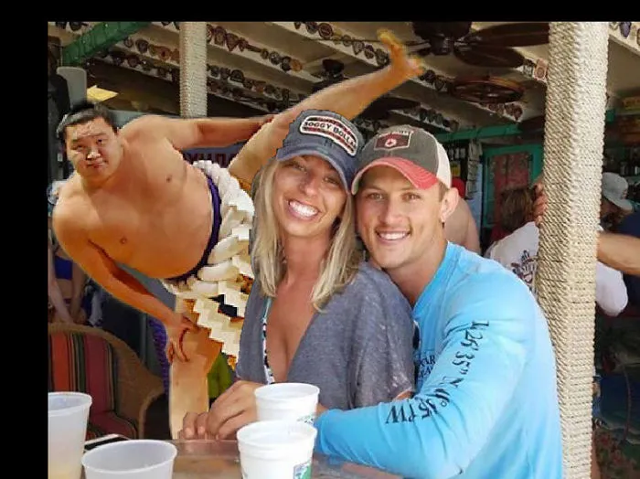 Couple Asks Internet To Photoshop Out Shirtless Guy From Engagement Photo, Regrets It Immediately