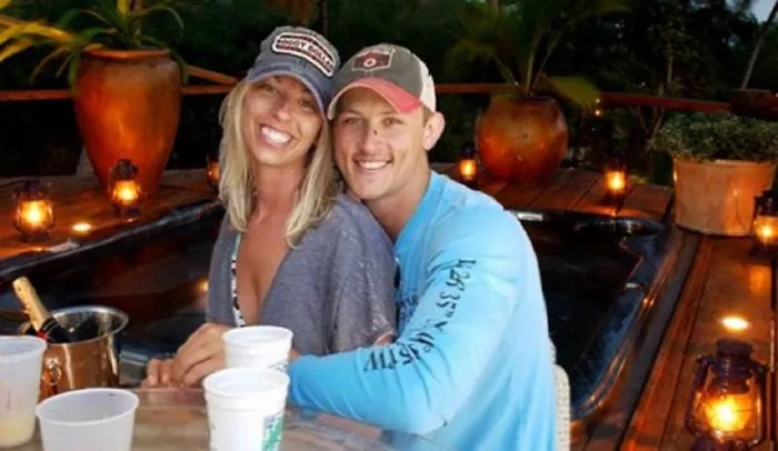 Couple Asks Internet To Photoshop Out Shirtless Guy From Engagement Photo, Regrets It Immediately
