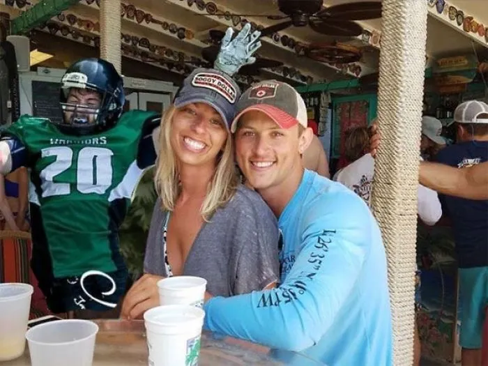 Couple Asks Internet To Photoshop Out Shirtless Guy From Engagement Photo, Regrets It Immediately