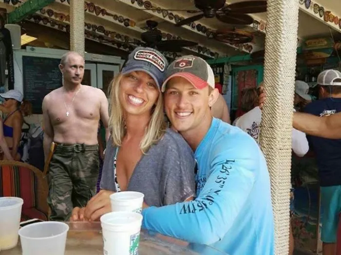Couple Asks Internet To Photoshop Out Shirtless Guy From Engagement Photo, Regrets It Immediately