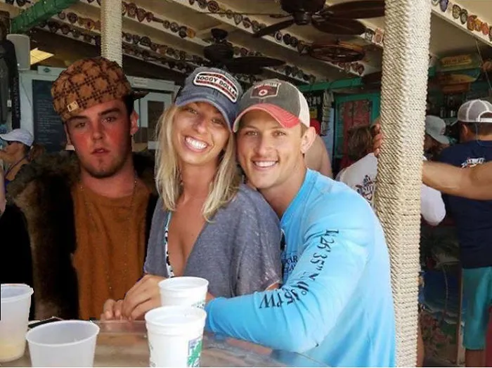 Couple Asks Internet To Photoshop Out Shirtless Guy From Engagement Photo, Regrets It Immediately