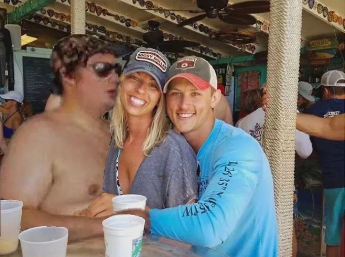 Couple Asks Internet To Photoshop Out Shirtless Guy From Engagement Photo, Regrets It Immediately