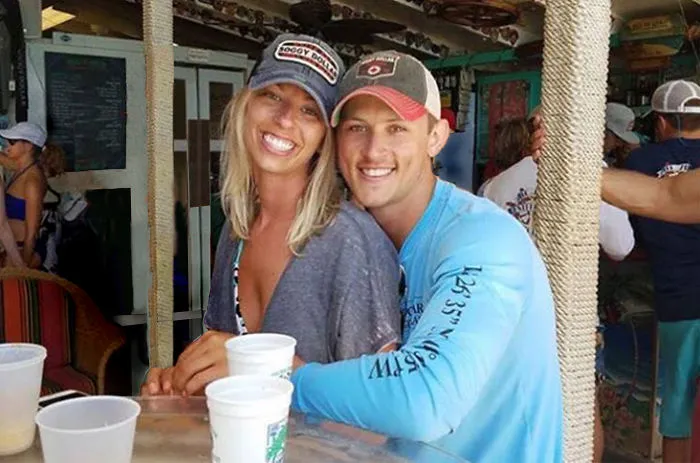 Couple Asks Internet To Photoshop Out Shirtless Guy From Engagement Photo, Regrets It Immediately