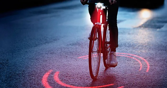 Michelin Just Made A Bike Lighting System That Protects Cyclists From Traffic Inside Its Ring Of Red Light