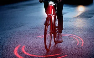 Michelin Just Made A Bike Lighting System That Protects Cyclists From Traffic Inside Its Ring Of Red Light