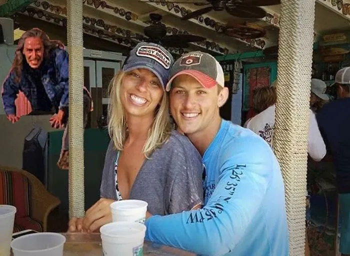 Couple Asks Internet To Photoshop Out Shirtless Guy From Engagement Photo, Regrets It Immediately