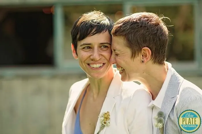 Two happy women hugging 