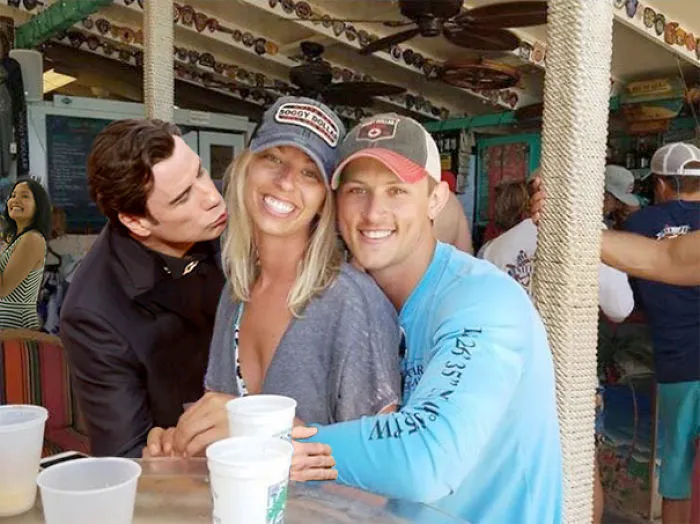 Couple Asks Internet To Photoshop Out Shirtless Guy From Engagement Photo, Regrets It Immediately