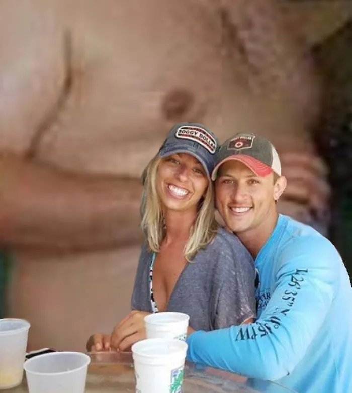 Couple Asks Internet To Photoshop Out Shirtless Guy From Engagement Photo, Regrets It Immediately