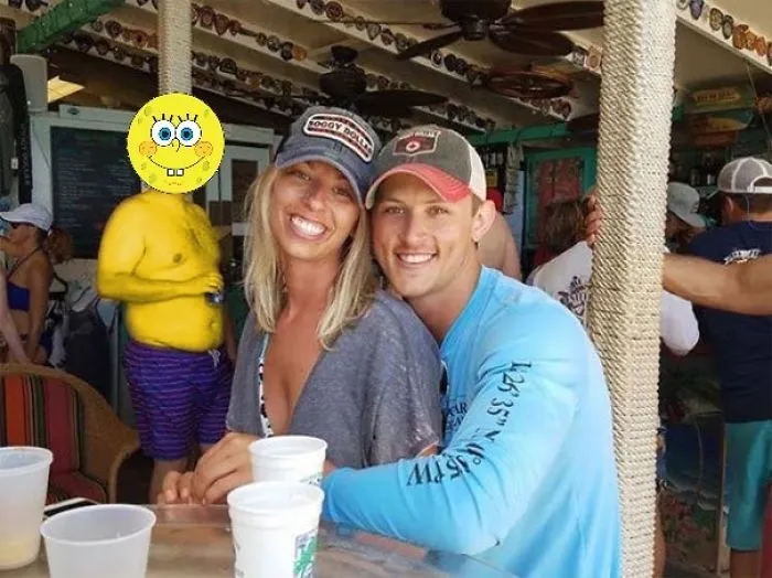 Couple Asks Internet To Photoshop Out Shirtless Guy From Engagement Photo, Regrets It Immediately