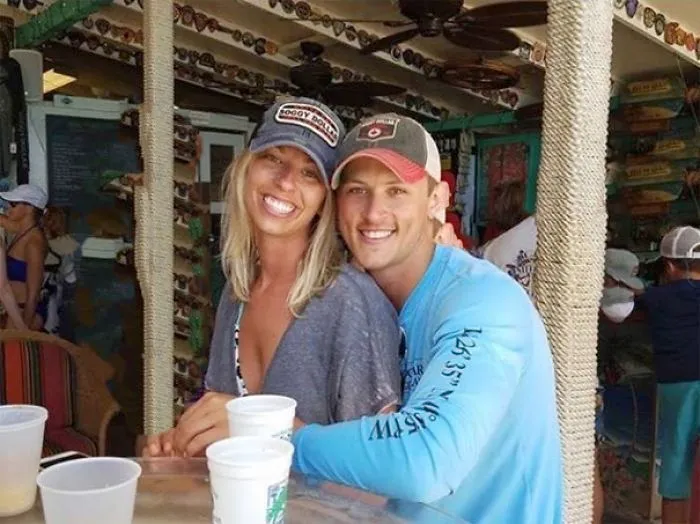 Couple Asks Internet To Photoshop Out Shirtless Guy From Engagement Photo, Regrets It Immediately