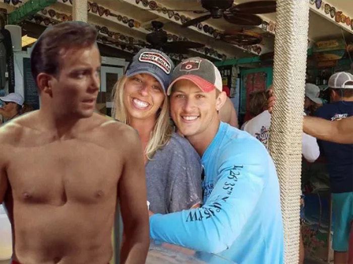 Couple Asks Internet To Photoshop Out Shirtless Guy From Engagement Photo, Regrets It Immediately