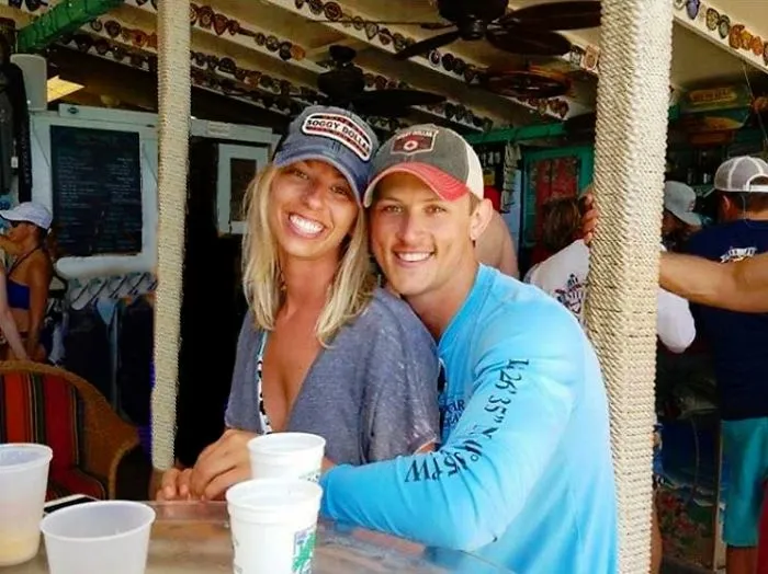 Couple Asks Internet To Photoshop Out Shirtless Guy From Engagement Photo, Regrets It Immediately