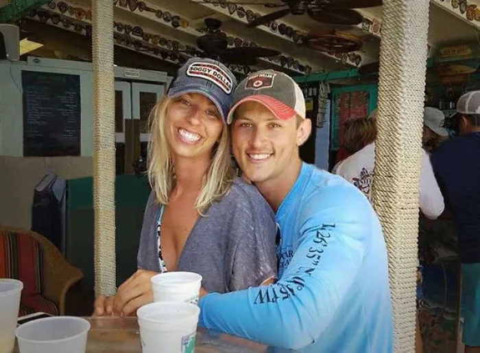 Couple Asks Internet To Photoshop Out Shirtless Guy From Engagement Photo, Regrets It Immediately