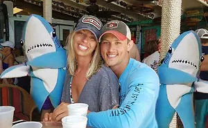 Couple Asks Internet To Photoshop Out Shirtless Guy From Engagement Photo, Regrets It Immediately