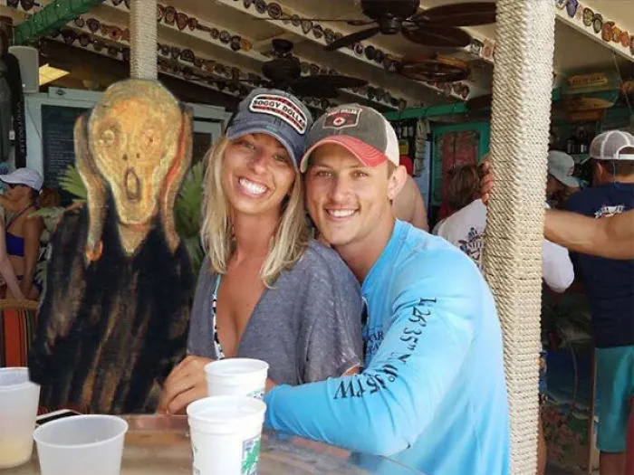 Couple Asks Internet To Photoshop Out Shirtless Guy From Engagement Photo, Regrets It Immediately