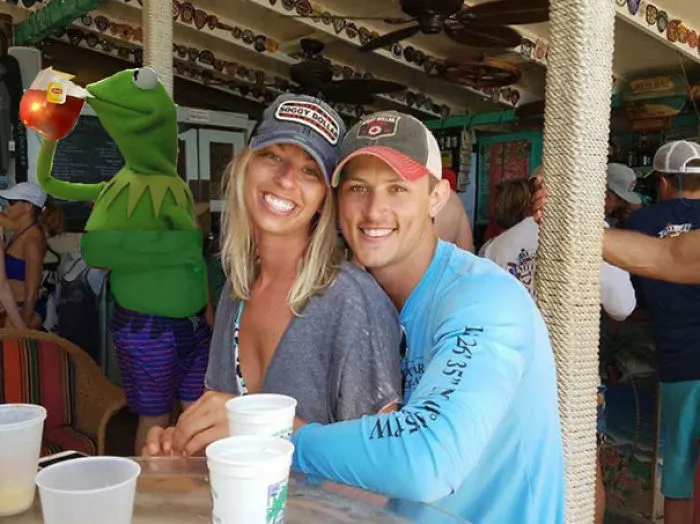 Couple Asks Internet To Photoshop Out Shirtless Guy From Engagement Photo, Regrets It Immediately