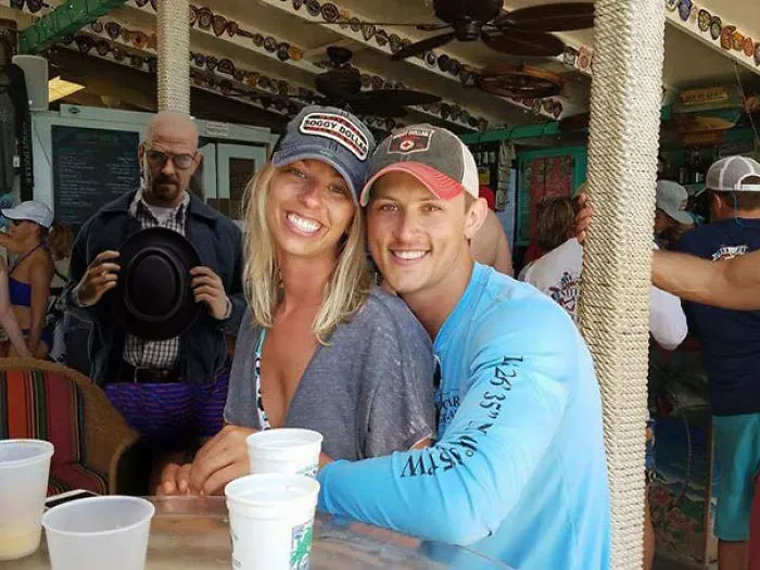 Couple Asks Internet To Photoshop Out Shirtless Guy From Engagement Photo, Regrets It Immediately