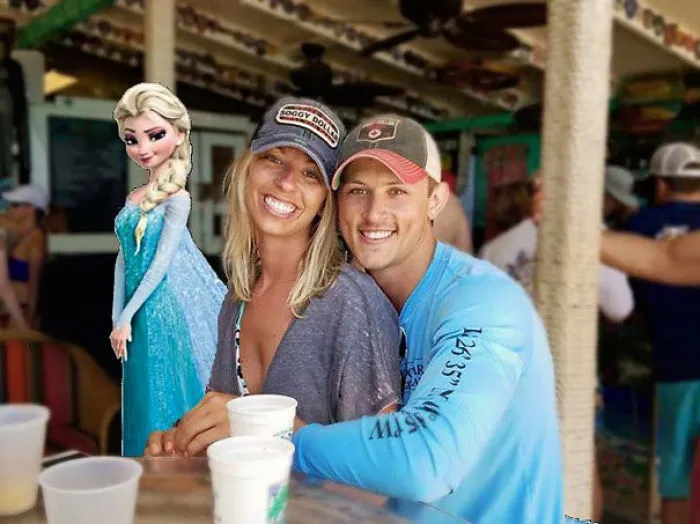 Couple Asks Internet To Photoshop Out Shirtless Guy From Engagement Photo, Regrets It Immediately