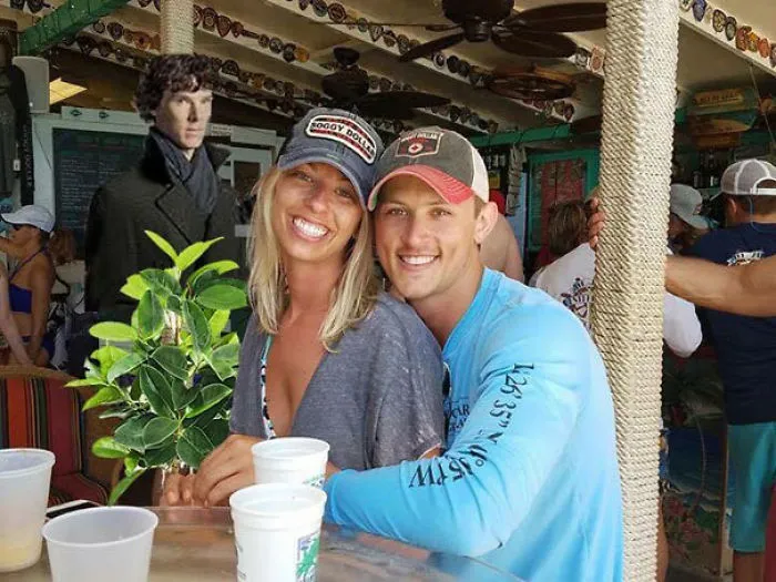 Couple Asks Internet To Photoshop Out Shirtless Guy From Engagement Photo, Regrets It Immediately