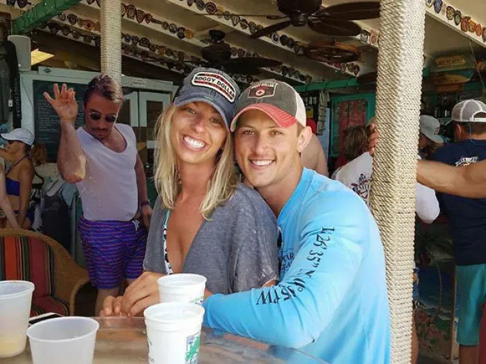 Couple Asks Internet To Photoshop Out Shirtless Guy From Engagement Photo, Regrets It Immediately