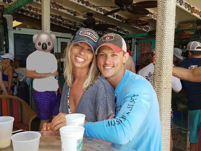 Couple Asks Internet To Photoshop Out Shirtless Guy From Engagement Photo, Regrets It Immediately