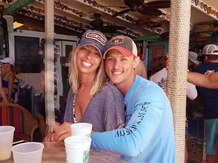 Couple Asks Internet To Photoshop Out Shirtless Guy From Engagement Photo, Regrets It Immediately