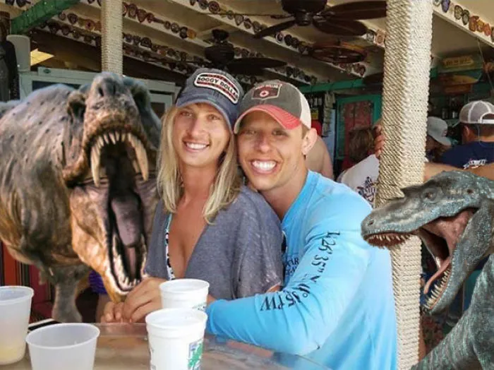 Couple Asks Internet To Photoshop Out Shirtless Guy From Engagement Photo, Regrets It Immediately