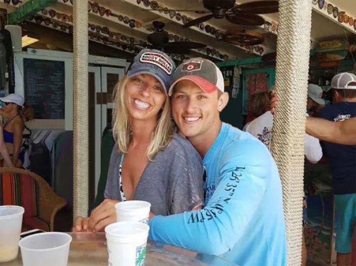 Couple Asks Internet To Photoshop Out Shirtless Guy From Engagement Photo, Regrets It Immediately