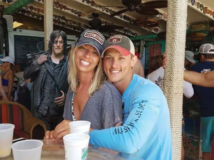 Couple Asks Internet To Photoshop Out Shirtless Guy From Engagement Photo, Regrets It Immediately