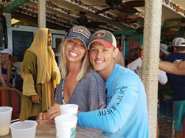 Couple Asks Internet To Photoshop Out Shirtless Guy From Engagement Photo, Regrets It Immediately