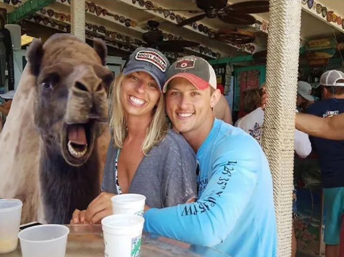 Couple Asks Internet To Photoshop Out Shirtless Guy From Engagement Photo, Regrets It Immediately