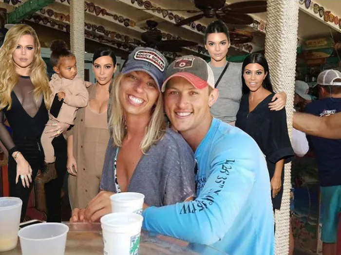 Couple Asks Internet To Photoshop Out Shirtless Guy From Engagement Photo, Regrets It Immediately