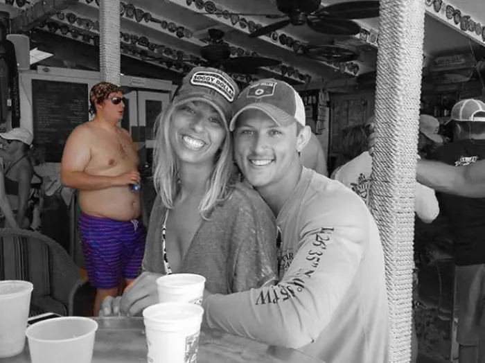 Couple Asks Internet To Photoshop Out Shirtless Guy From Engagement Photo, Regrets It Immediately