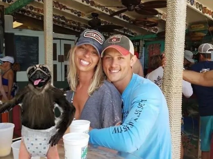 Couple Asks Internet To Photoshop Out Shirtless Guy From Engagement Photo, Regrets It Immediately