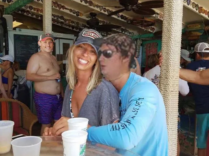 Couple Asks Internet To Photoshop Out Shirtless Guy From Engagement Photo, Regrets It Immediately