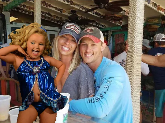 Couple Asks Internet To Photoshop Out Shirtless Guy From Engagement Photo, Regrets It Immediately