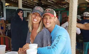Couple Asks Internet To Photoshop Out Shirtless Guy From Engagement Photo, Regrets It Immediately
