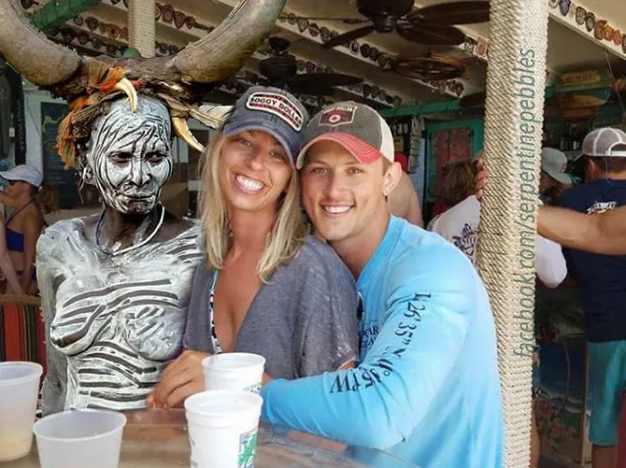 Couple Asks Internet To Photoshop Out Shirtless Guy From Engagement Photo, Regrets It Immediately