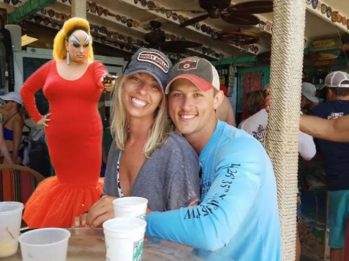 Couple Asks Internet To Photoshop Out Shirtless Guy From Engagement Photo, Regrets It Immediately