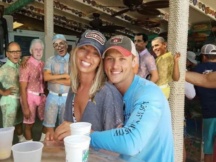 Couple Asks Internet To Photoshop Out Shirtless Guy From Engagement Photo, Regrets It Immediately