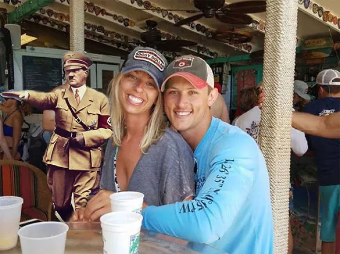Couple Asks Internet To Photoshop Out Shirtless Guy From Engagement Photo, Regrets It Immediately